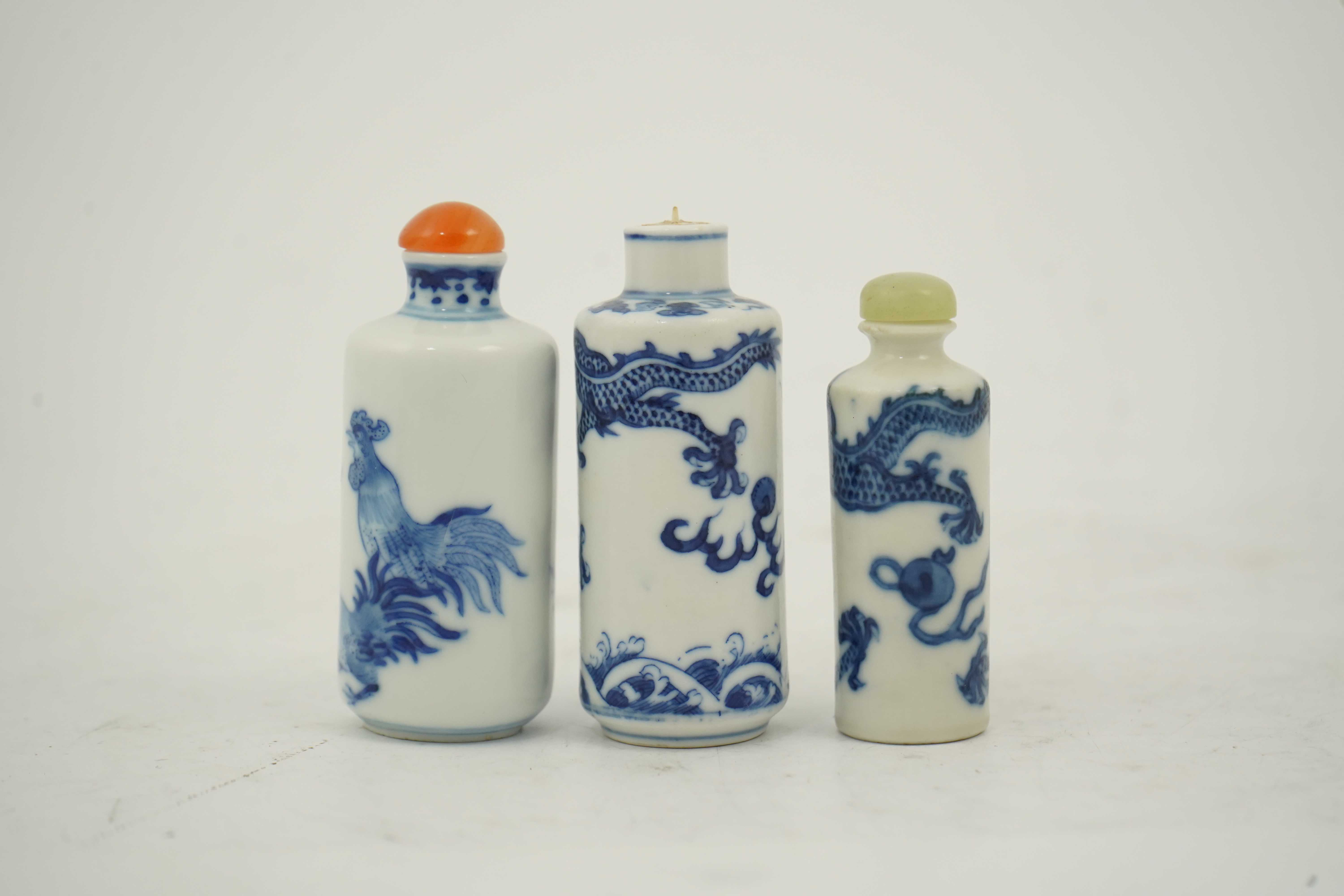 Three Chinese blue and white snuff bottles, c.1850-1900